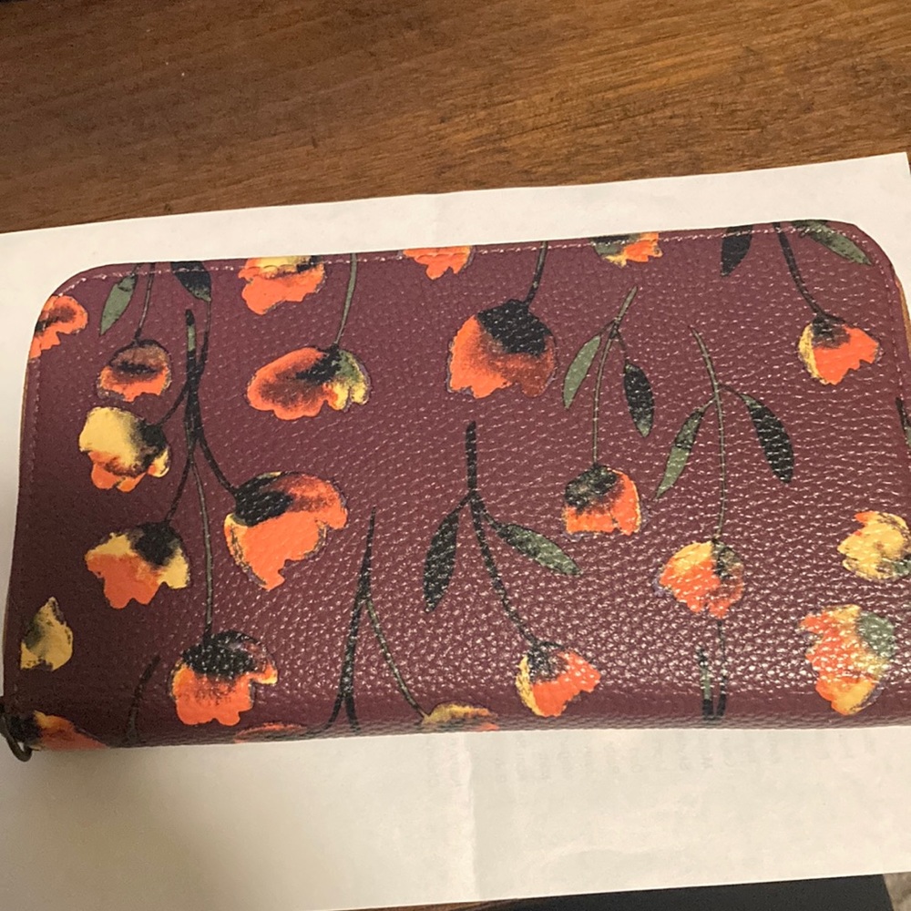 Thirty one all about the Benjamin wallet and wrist strap